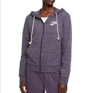 Nike women’s zip hoodie in pink/purple color. Size M women’s.